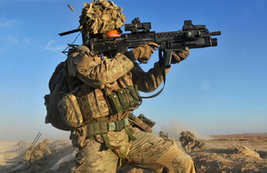 A soldier provides covering fire as his colleagues in the Brigade Reconnaissance Force cross open ground (library image) [Picture: Sergeant Rupert Frere, Crown copyright]
