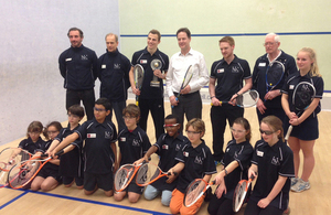 The Deputy Prime Minister posing with squash players