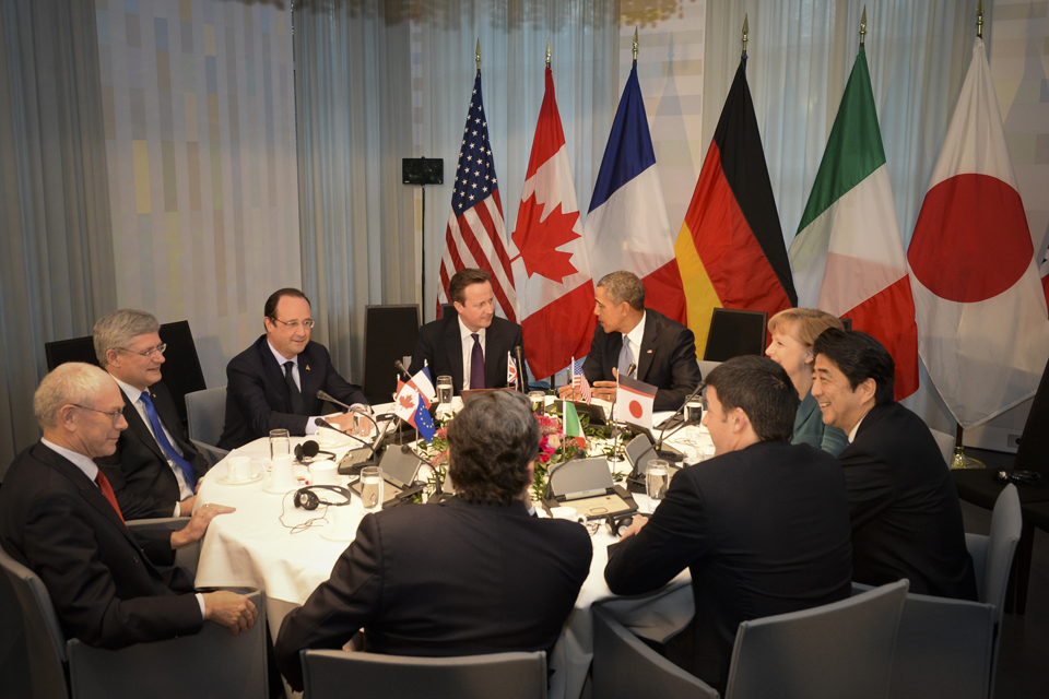 David Cameron and other world leaders round a table.