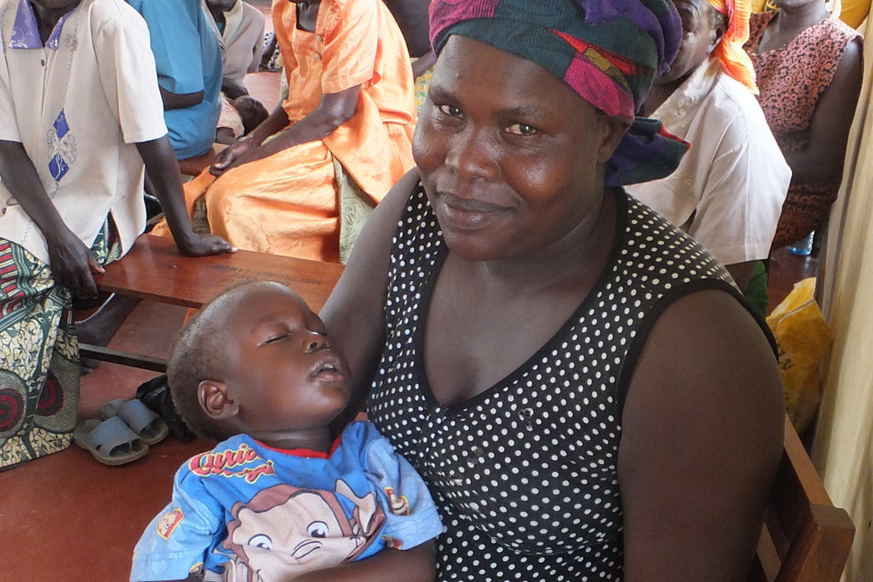 Agnes with her son Sunday at a Motivation training session. Picture: Motivation 