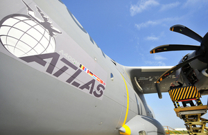 An Airbus Defence and Space technician works on the propeller housing of an A400M Atlas in Seville [Picture: Senior Aircraftwoman Helen Farrer, Crown copyright]