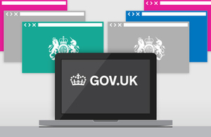 A laptop with text saying "GOV.UK"