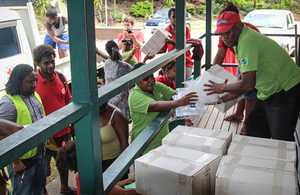 Relief items being distributed in the Solomon Islands. Picture: World Vision Australia via Twitter