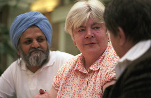 Elderly woman and man talking