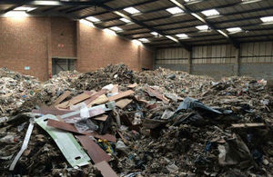 Hundreds of tons of fly-tipped waste inside warehouse