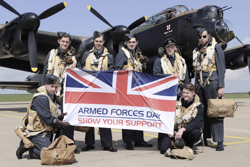 A re-enactment group show their support for Armed Forces Day
