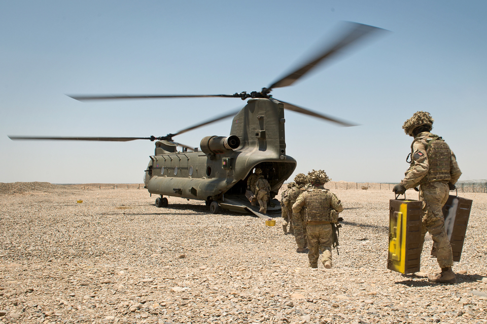 Soldiers boarding an RAF Chinook helicopter