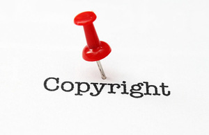 Image of the word copyright and a red pin