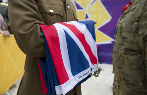 A member of the Royal Gurkha Rifles carries an Australian flag prior to a flag-raising ceremony at the London 2012 Olympic Games (library image) [Picture: Sergeant Alison Baskerville, Crown copyright]