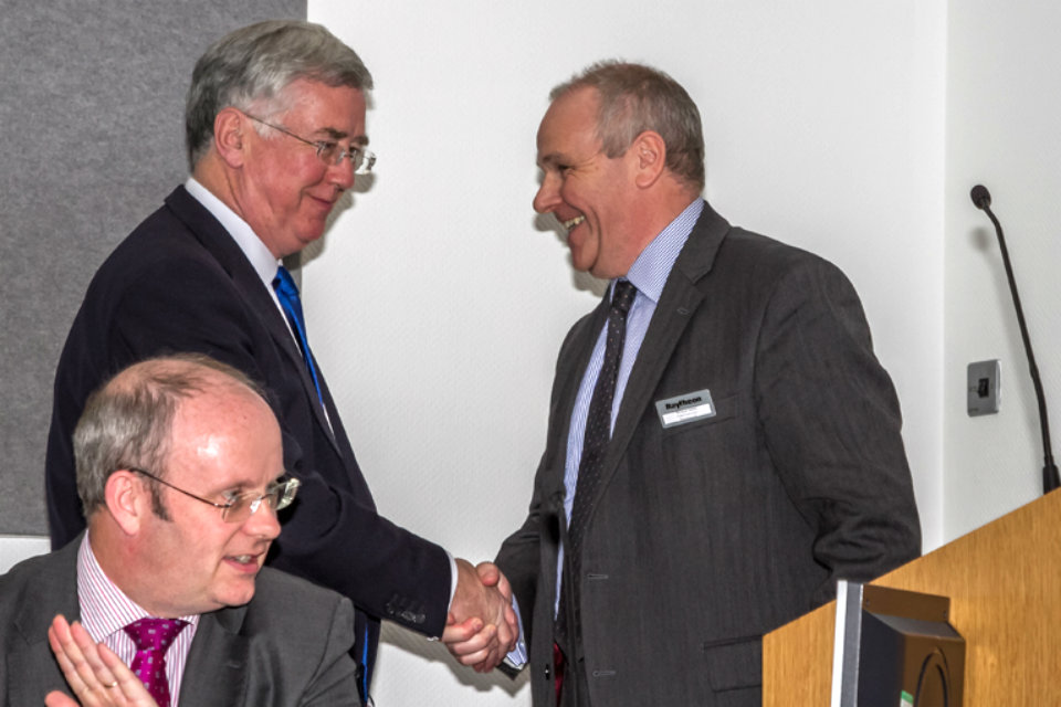 The Rt Hon Michael Fallon MP is greeted by Richard Daniel prior to his afternoon keynote address
