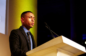 Tahiduz speaking about his experiences at a public event