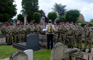 Paratroopers at a cemetery in Breville as part of a study of D-Day battlefields [Picture: Corporal Andy Reddy RLC, Crown copyright]