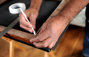 Keith working on a picture frame