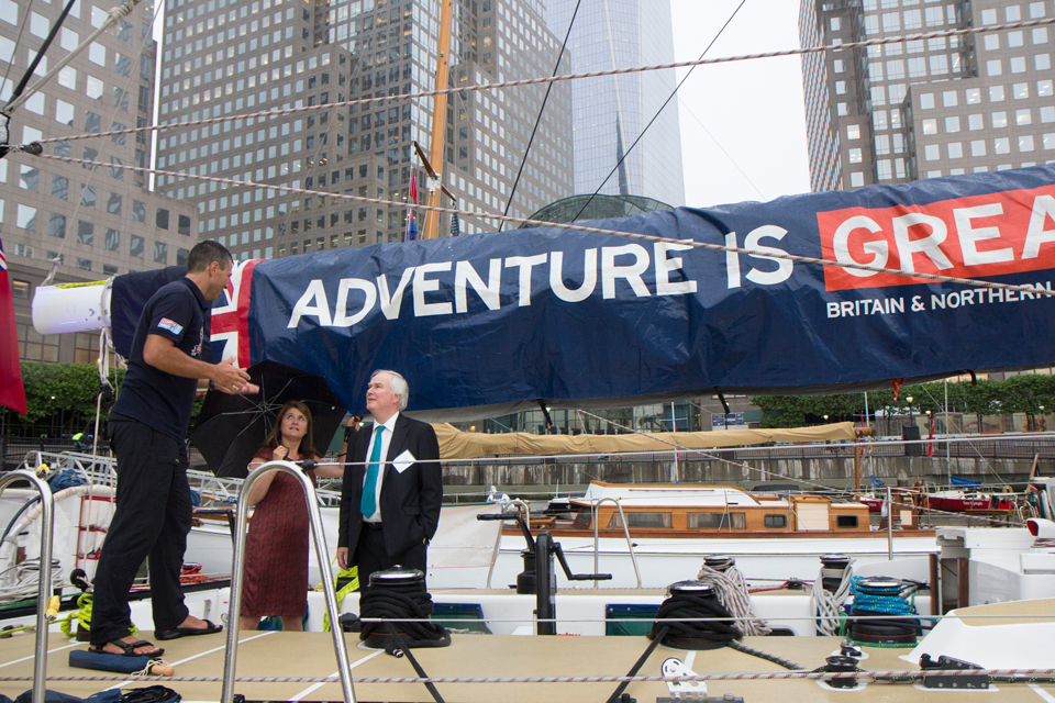 Sir Mark Lyall Grant and Lady Sheila Lyall Grant take a tour of the boat from one of the crew members.