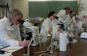 Scientists analyse samples during a Government Chemist training course.