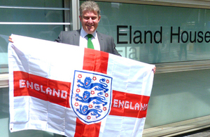 Brandon Lewis with the Three Lions flag