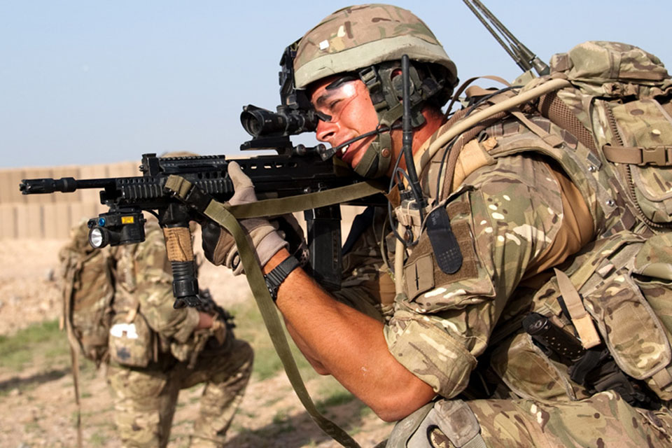 Lieutenant Tom Lucy, K Company 42 Commando Royal Marines, on patrol with his section outside of Patrol Base 5 in Helmand Province, Afhanistan