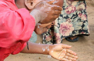 13-year-old Neema washes her face to protect against the blinding disease trachoma. Millions more like Neema across Africa will be protected from blindness through a new Sightsavers-led programme funded by the UK. Picture: Suzanne Porter/SightSavers