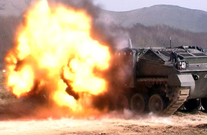 Defence Science and Technology Laboratory (Dstl) testing of electric armour on an armoured personnel carrier at one of their test range facilities (stock image)