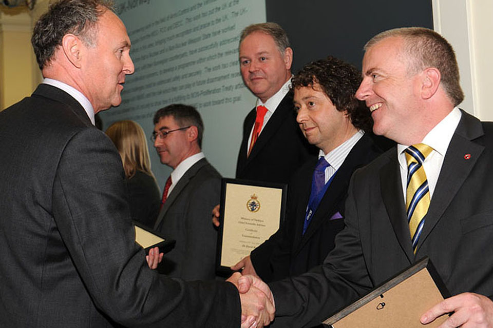 Professor Mark Welland, the Chief Scientific Adviser (left), meets Defence scientists at the London awards ceremony of the CSA Commendation Scheme