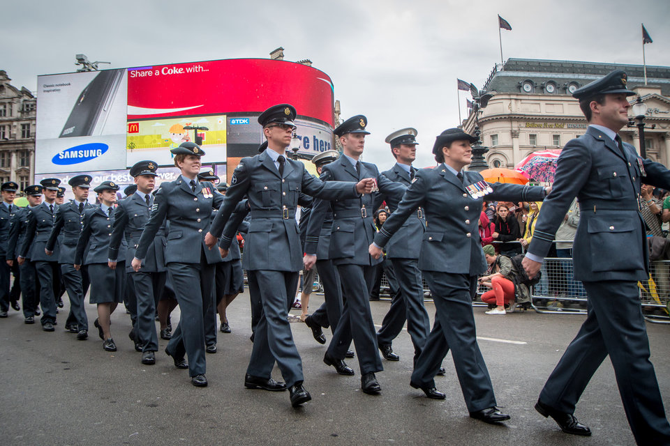 Royal Air Force personnel marching through Piccadilly Circus in London