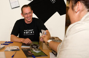 A soldier from 7th Armoured Brigade provides a saliva sample as part of registering as a bone marrow donor