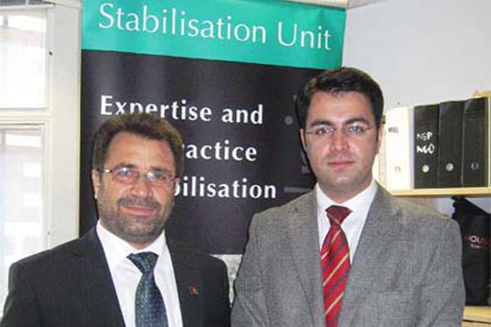 Pamir Patang (right) with Governor Gulab Mangal on a recent visit to the Stabilisation Unit in London