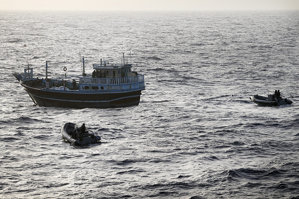 Boarding teams approach the dhow