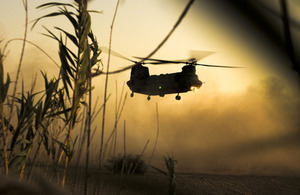 A Royal Air Force Chinook takes off during an exercise whilst practising dust landings; from the Section Portfolio category which was won by the Mobile News Team at HQ Air Command