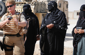 MOD police officer Isabella McManus trains female Afghan police officers to use the Sig Sauer 9mm pistol