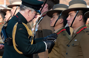 Prince Charles presenting campaign medals to members of 1st Battalion The Royal Gurkha Rifles