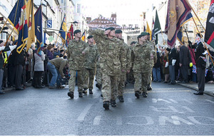 Crowds cheer on soldiers of 1st Battalion The Rifles as they march through Chepstow