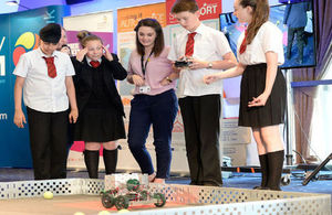 Children watch a demonstration at the Skill Show