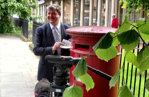 Alistair Carmichael at postbox