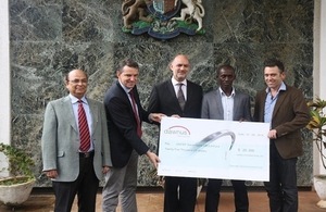 Hand over of cheque by Dawnus International