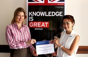 Chargé d'affaires Rosie Tapper awards Tursun Aitbaeva with a Chevening Certificate