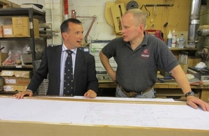 Wales Office minister Alun Cairns with Welsh cabinet maker Paul Rathkey.