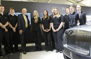 Vince Cable with Rolls Royce apprentices.