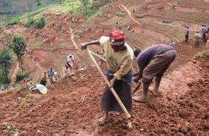 A woman in Rwanda works to prevent soil erosion. Picture: Sam Thompson/DFID Rwanda