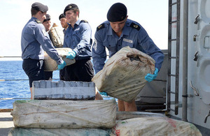 Royal Navy sailors loading the seized cocaine onto the deck of a US Coast Guard vessel [Picture: Leading Airman (Photographer) Stephen Johncock, Crown copyright]