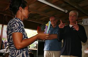 International Development Minister Desmond Swayne, talking to a business woman who has benefitted from a DFID-supported micro-finance scheme in Burma. Picture: DFID