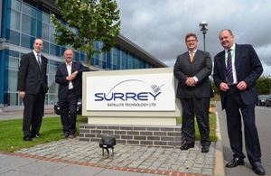 From left at SSTL: Lord Livingston; Professor Sir Martin Sweeting OBE, FRS, FREng, Executive Chairman, SSTL; Matt Perkins, CEO, SSTL; Lewis Scott, Regional Director, UKTI South East