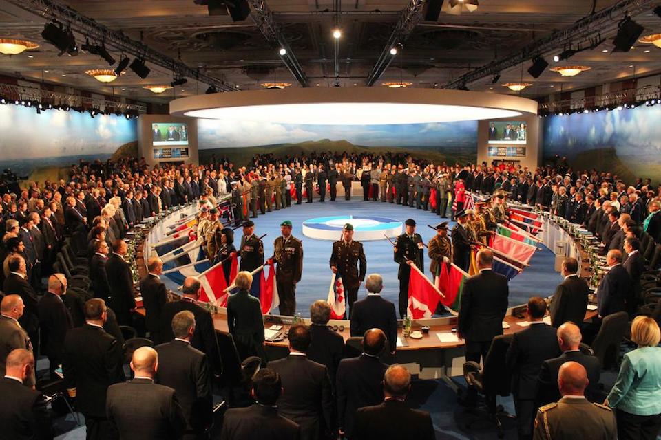 Military procession at NATO working session on Afghanistan.