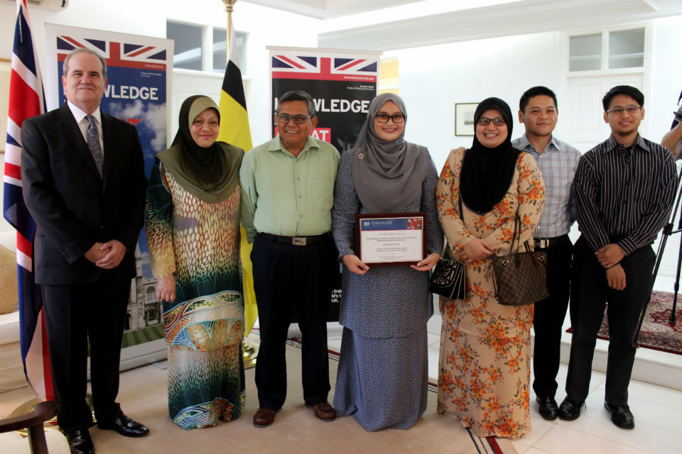 British High Commissioner David Campbell with Siti Nurfateha Abdullah and her family