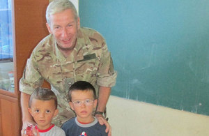 Lieutenant Colonel Jones visiting Fehmi Rama Elementary School, delivering some of the donated toys and equipment.