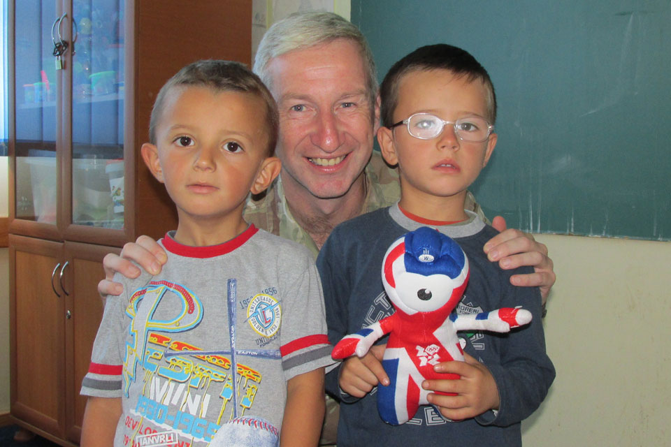 Lieutenant Colonel Jones visiting Fehmi Rama Elementary School, delivering some of the donated toys and equipment.  