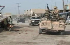 Soldiers of 1st Battalion The Royal Regiment of Scotland on patrol in the Sangin area of Helmand's Green Zone