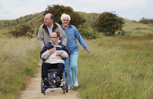 Family enjoying the access for all trail at Saltfleetby-Theddlethorpe Dunes NNR