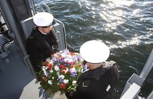 Wreath laying in the sea