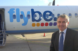 Robert Goodwill with Flybe aeroplane.